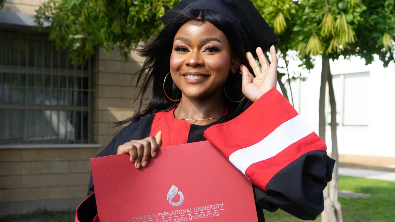 Graduate celebrating with a qualification